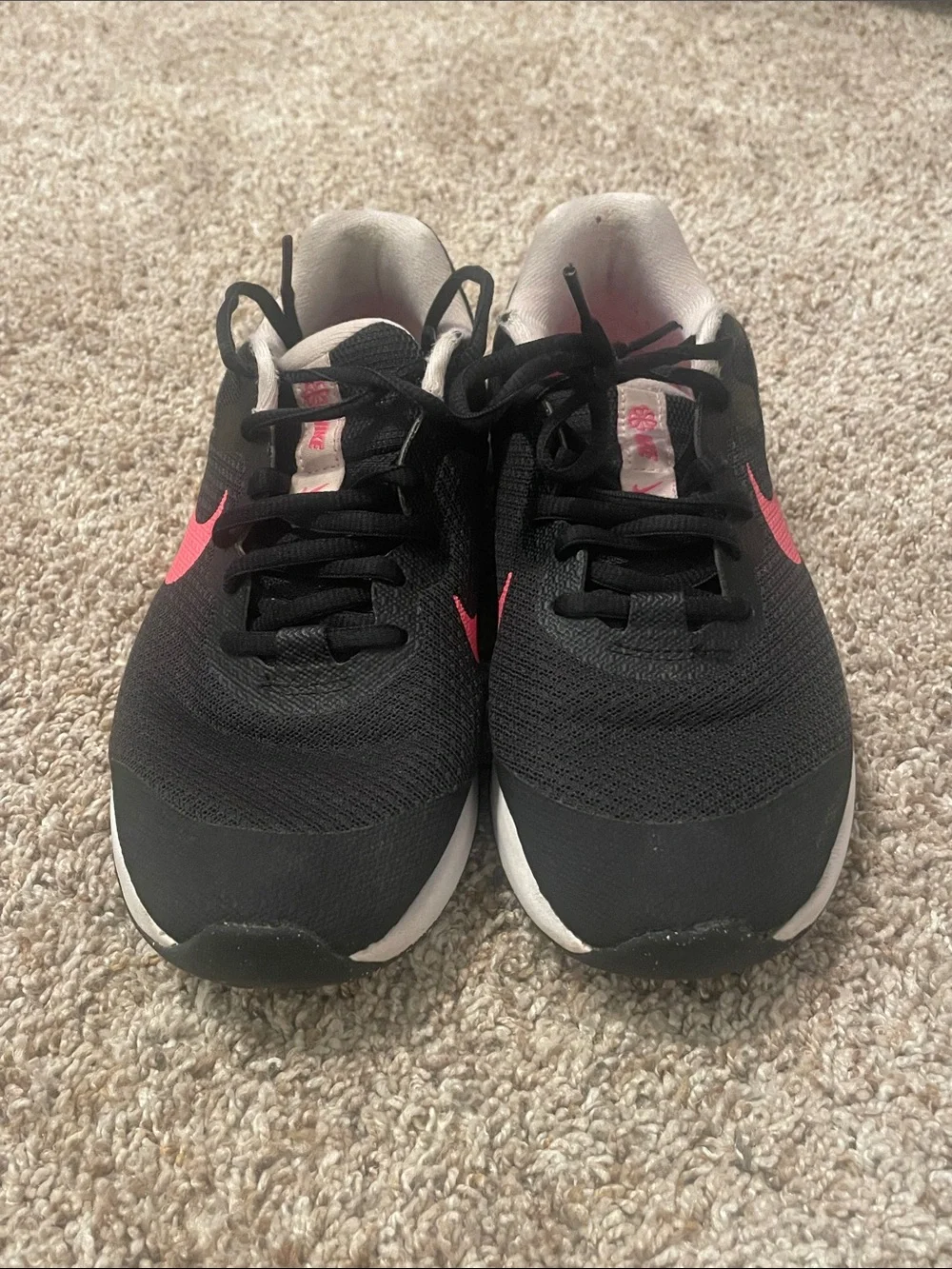 Nike Black Sneakers with Pink Swoosh Accents